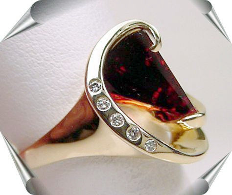Lighthouse lens garnet and diamond ring